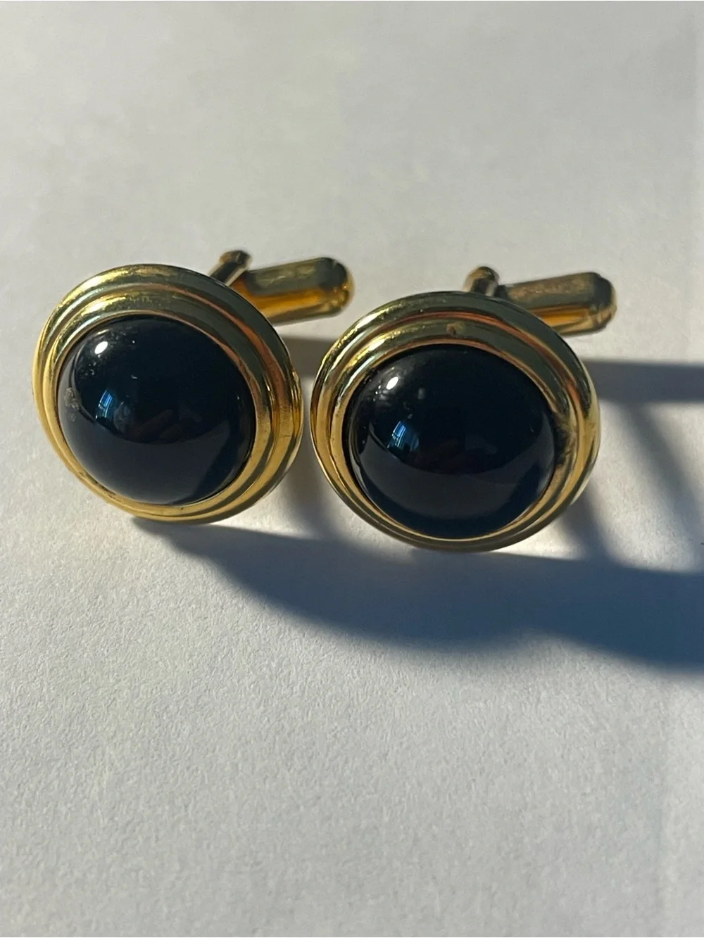 Gold tone black onyx round cuff links